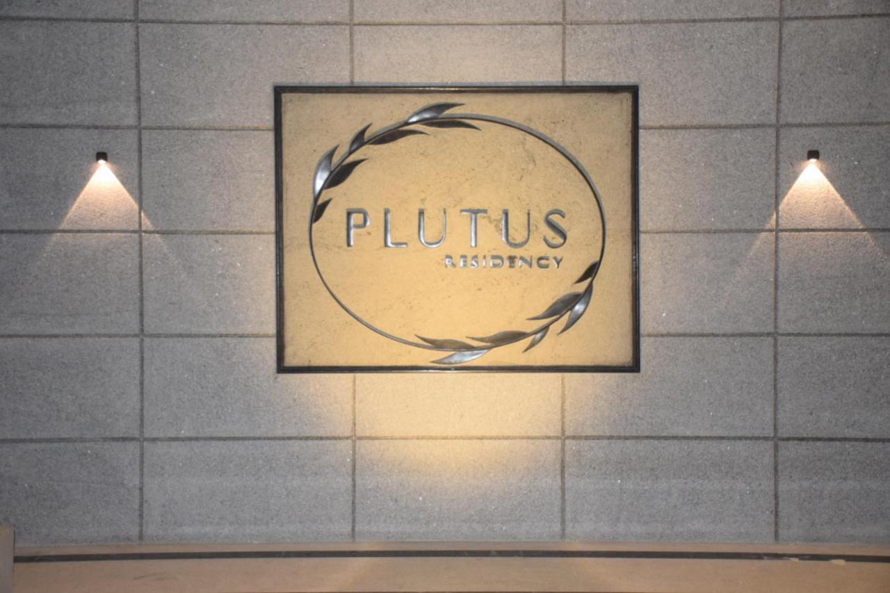 Отель Plutus Residency Ауровиль Экстерьер фото