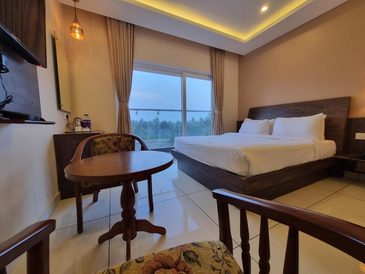 Отель Plutus Residency Ауровиль Экстерьер фото